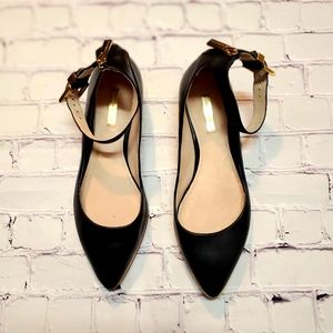 Black Louise Et Cie flats with gold trim ✨